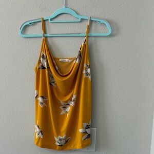 Elegant women’s yellow floral tank top/blouse with spaghetti straps.